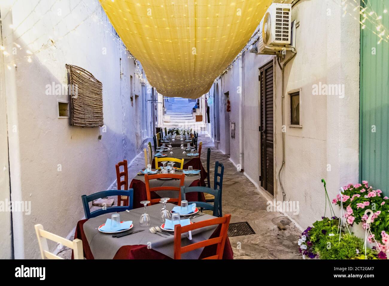 tyical restaurant in street of ancient village of Southern Italy Stock Photo