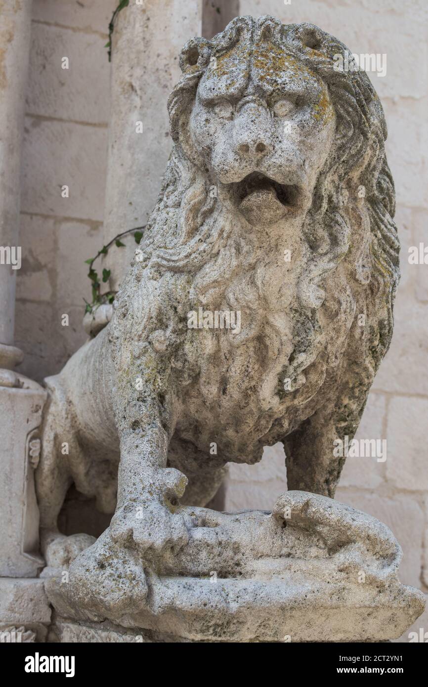 Medieval stone lion Stock Photo