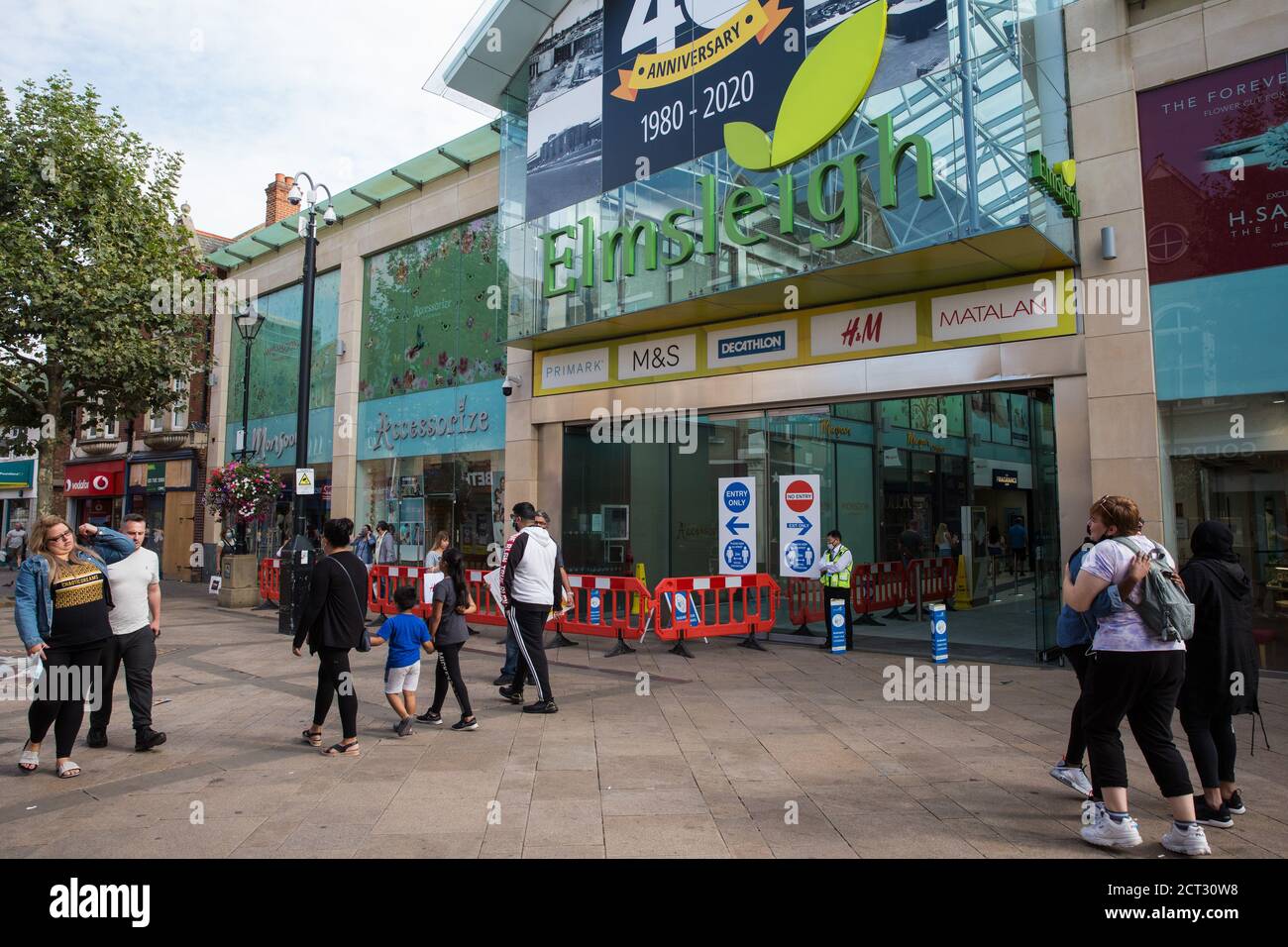 Staines-upon-Thames, UK. 20th September, 2020. Local residents do some Sunday shopping in the town centre. The Borough of Spelthorne, of which Staines-upon-Thames forms part along with Ashford, Sunbury-upon-Thames, Stanwell, Shepperton and Laleham, has been declared an Ôarea of concernÕ for COVID-19 by the government following a marked rise in coronavirus infections which is inconsistent with other areas of Surrey. Credit: Mark Kerrison/Alamy Live News Stock Photo