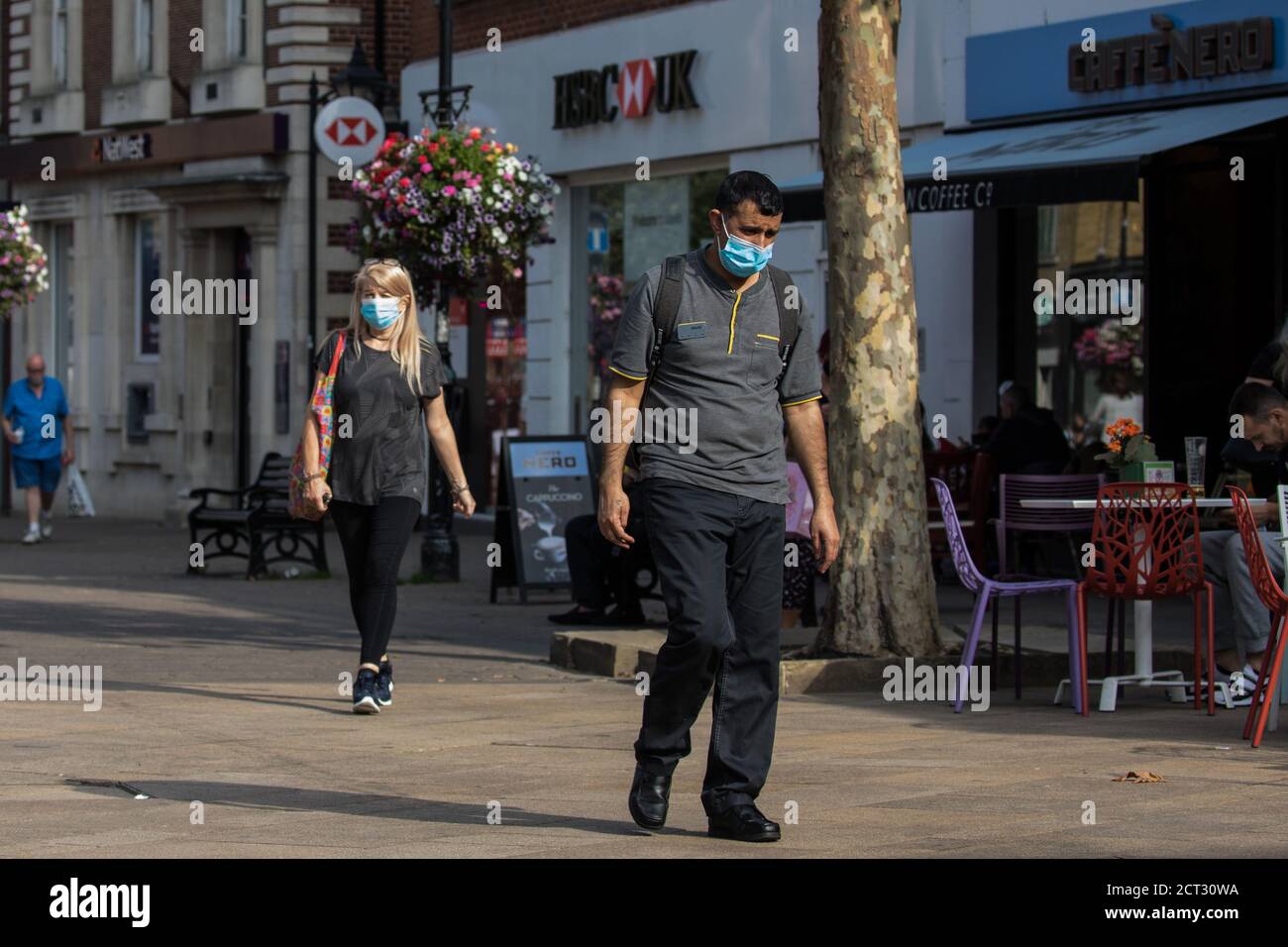 Staines-upon-Thames, UK. 20th September, 2020. Shoppers wear face coverings to help prevent the spread of the coronavirus. The Borough of Spelthorne, of which Staines-upon-Thames forms part along with Ashford, Sunbury-upon-Thames, Stanwell, Shepperton and Laleham, has been declared an Ôarea of concernÕ for COVID-19 by the government following a marked rise in coronavirus infections which is inconsistent with other areas of Surrey. Credit: Mark Kerrison/Alamy Live News Stock Photo