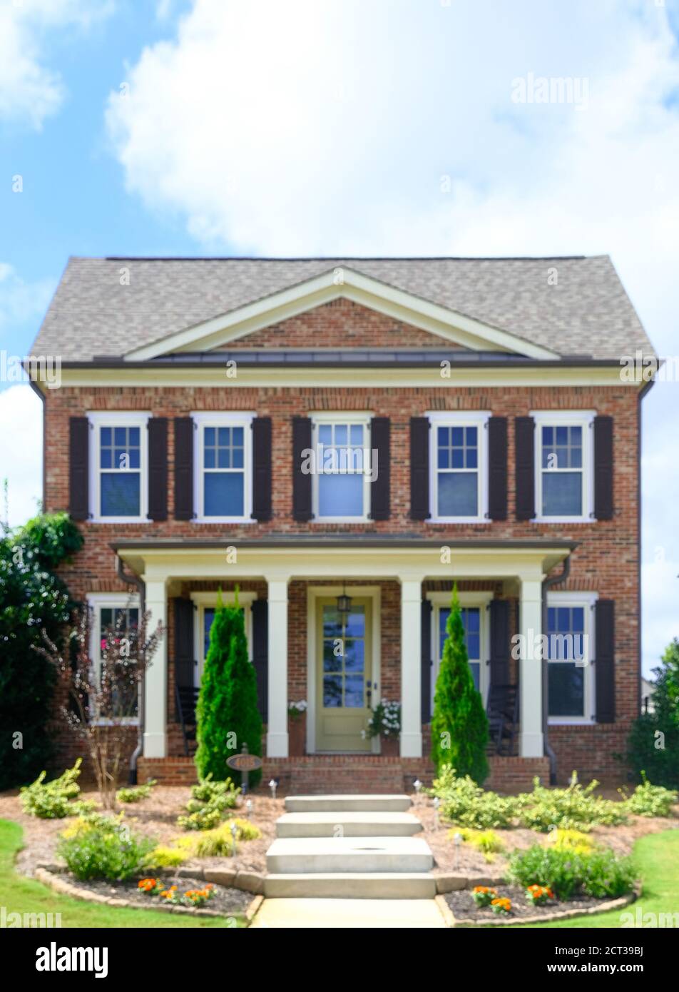 Brick Townhouse with Columns Stock Photo Alamy