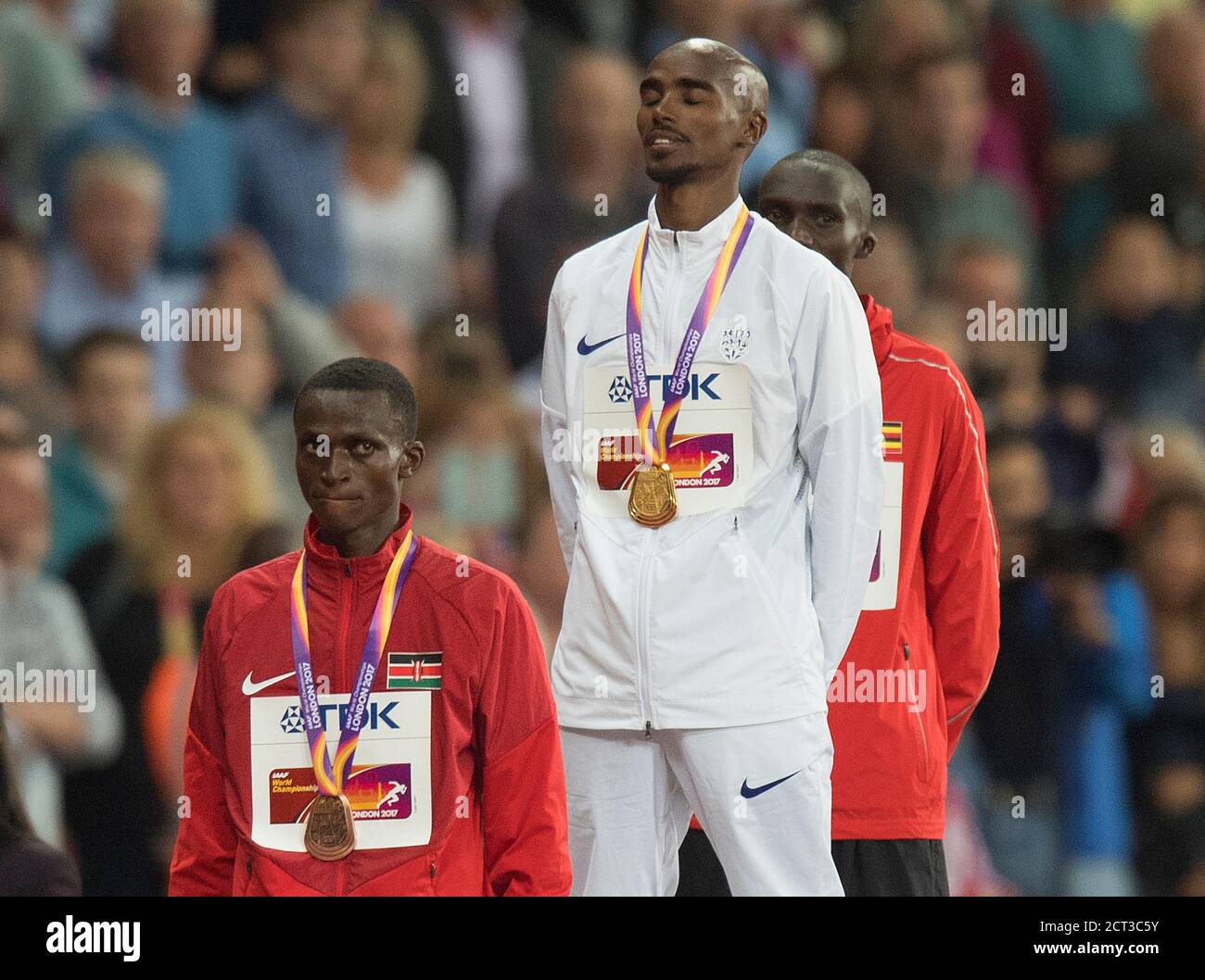Mo Farah on the medal podium during the National Anthem after wining  the 10,000m. World Athletics Championships.Picture : © Mark Pain / Alamy Stock Photo