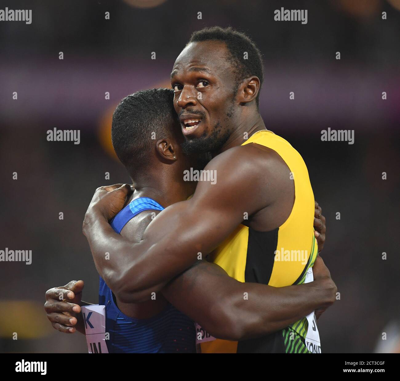 Usain Bolt hugs the new 100m World Champion Justin Gatlin   World Athletics Championships 2017.  Copyright Photo © Mark Pain / Alamy Stock Photo