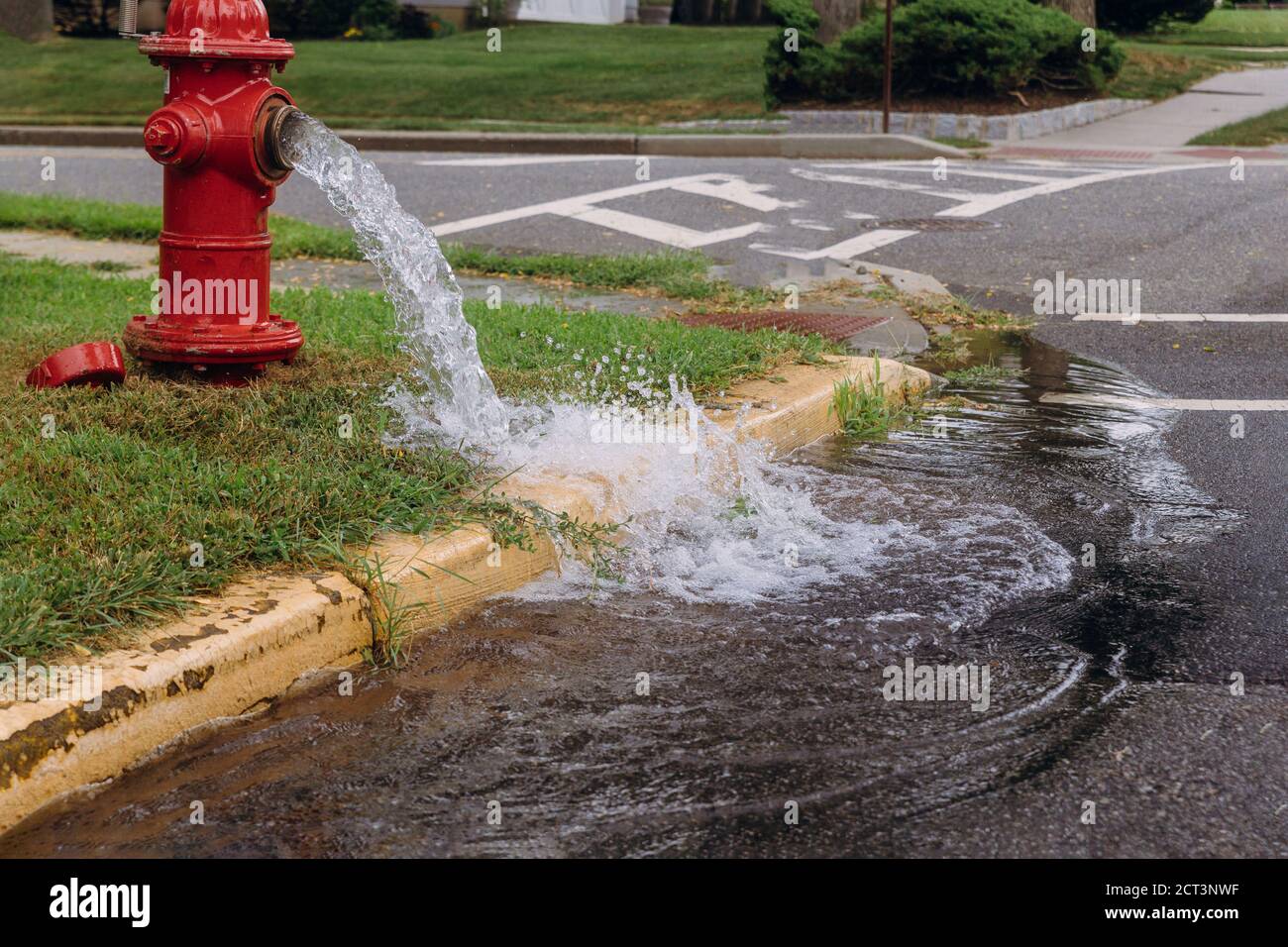 Opened fire hydrant later leak spray in residents open fire hydrants Stock Photo Alamy