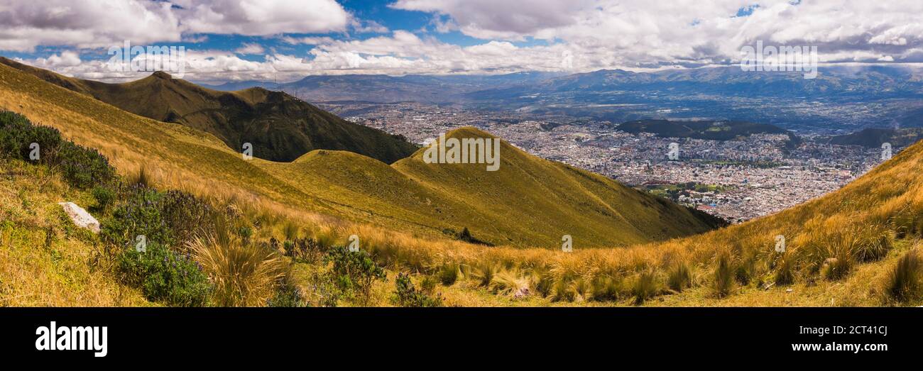 Panoramic photo of City of Quito Old Town and the North, seen from the Pichincha Volcano, Ecuador, South America Stock Photo
