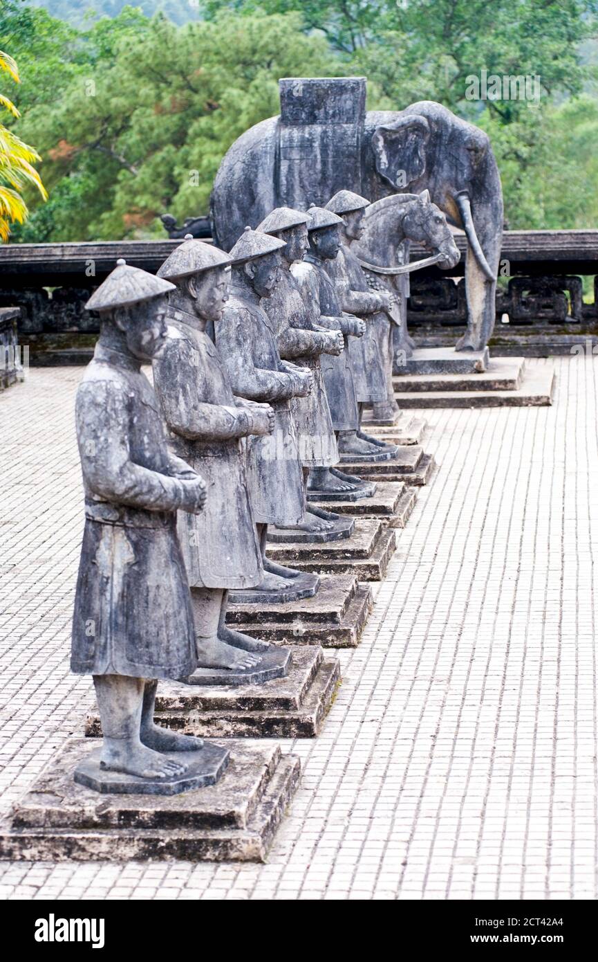 Stone Statues of Vietnamese People and an Elephant at The Tomb of Khai