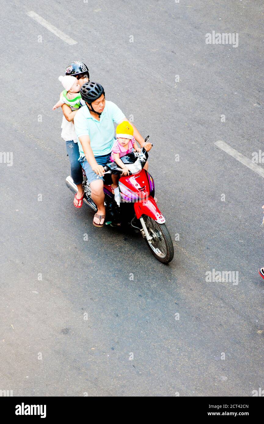 Family Packed onto a Motorbike, Saigon, Vietnam, Southeast Asia Stock
