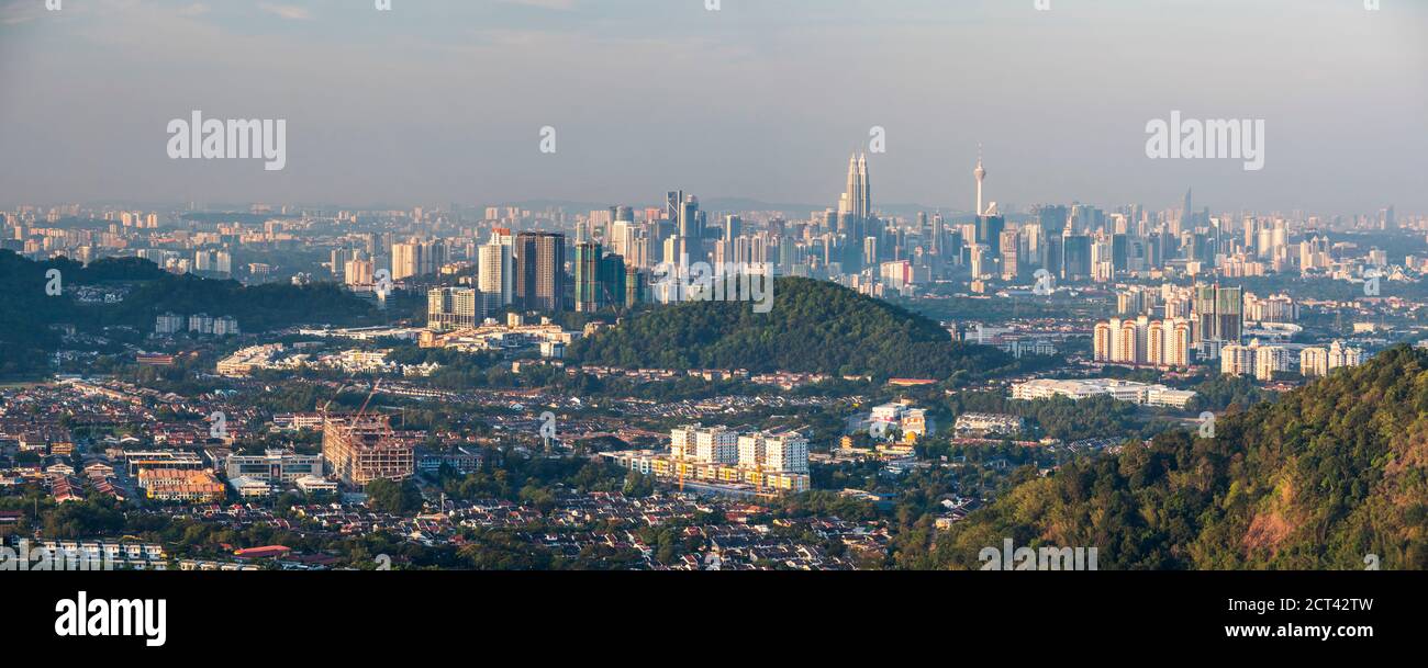 Kuala Lumpur skyline seen at dawn from Bukit Tabur Mountain, Malaysia, Southeast Asia Stock Photo