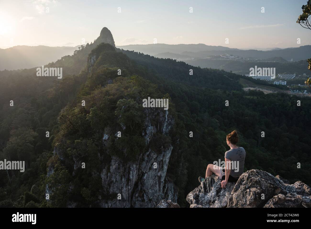 Tourist hiking up Bukit Tabur Mountain, Kuala Lumpur, Malaysia, Southeast Asia Stock Photo