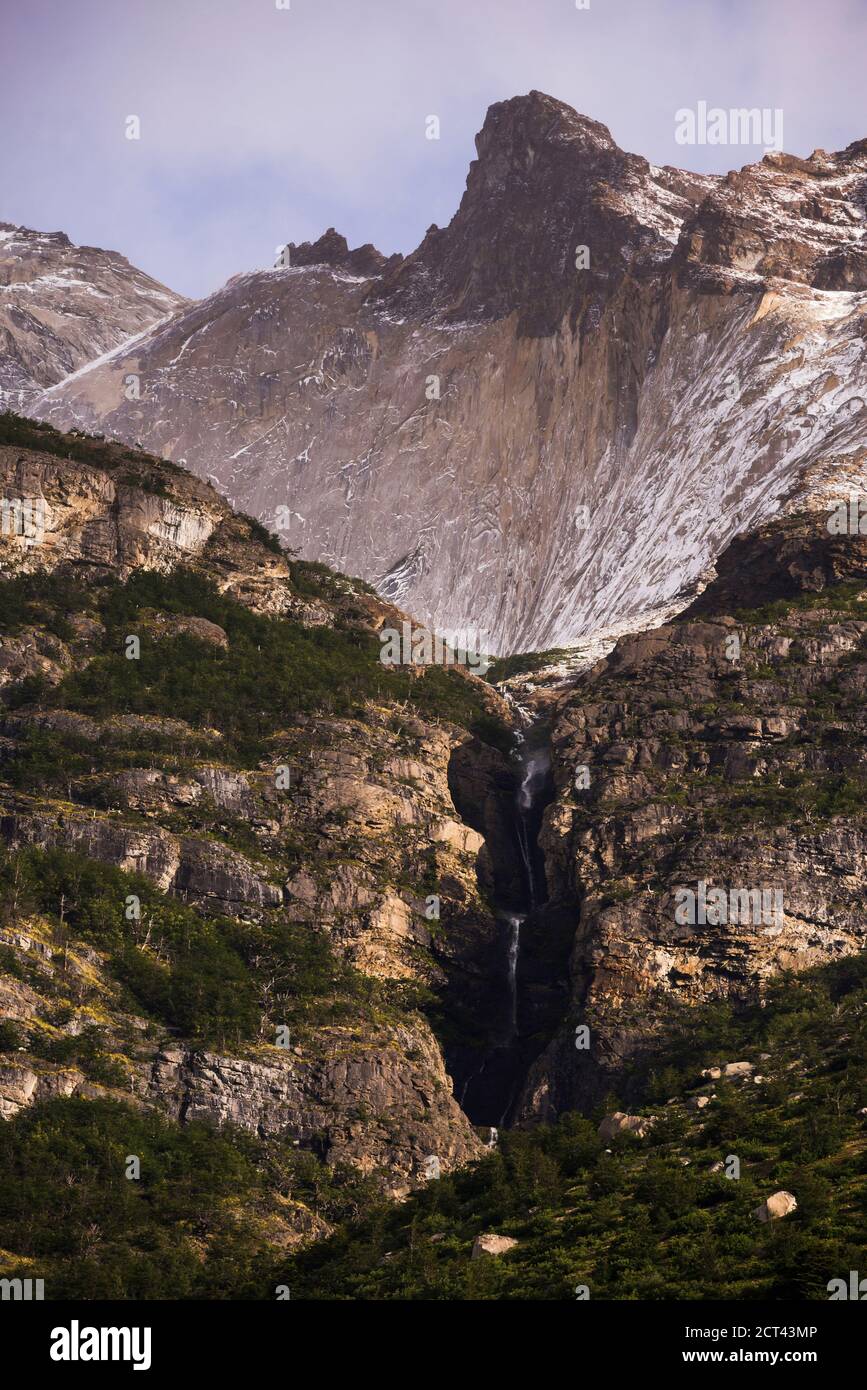 Los Cuernos and a waterfall in Torres del Paine National Park (Parque Nacional Torres del Paine), Patagonia, Chile, South America Stock Photo