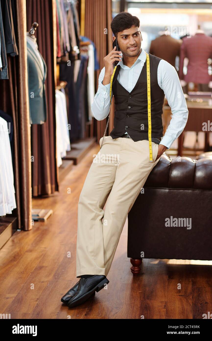 Atelier owner calling on phone Stock Photo