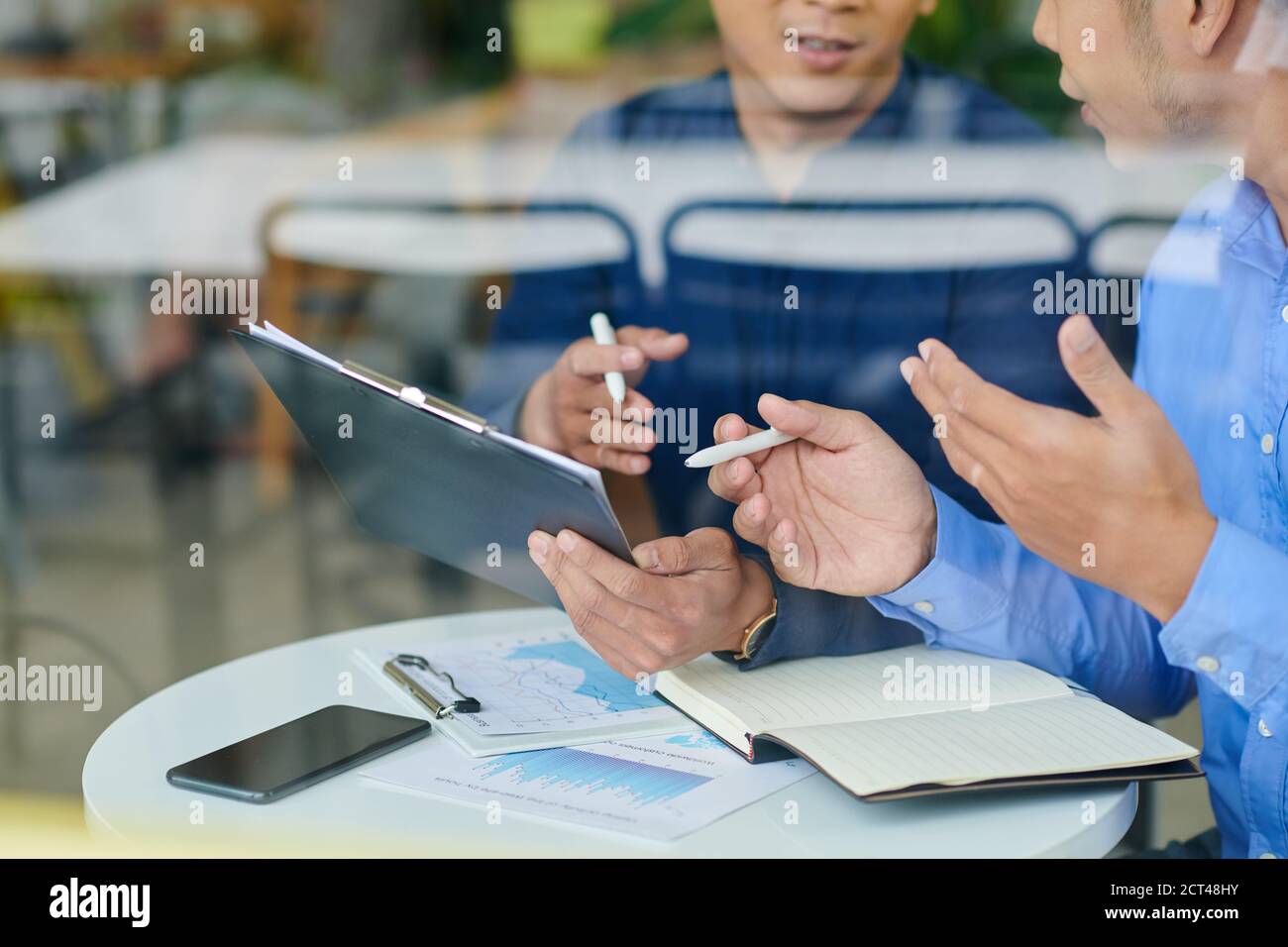 Businessmen having meeting Stock Photo