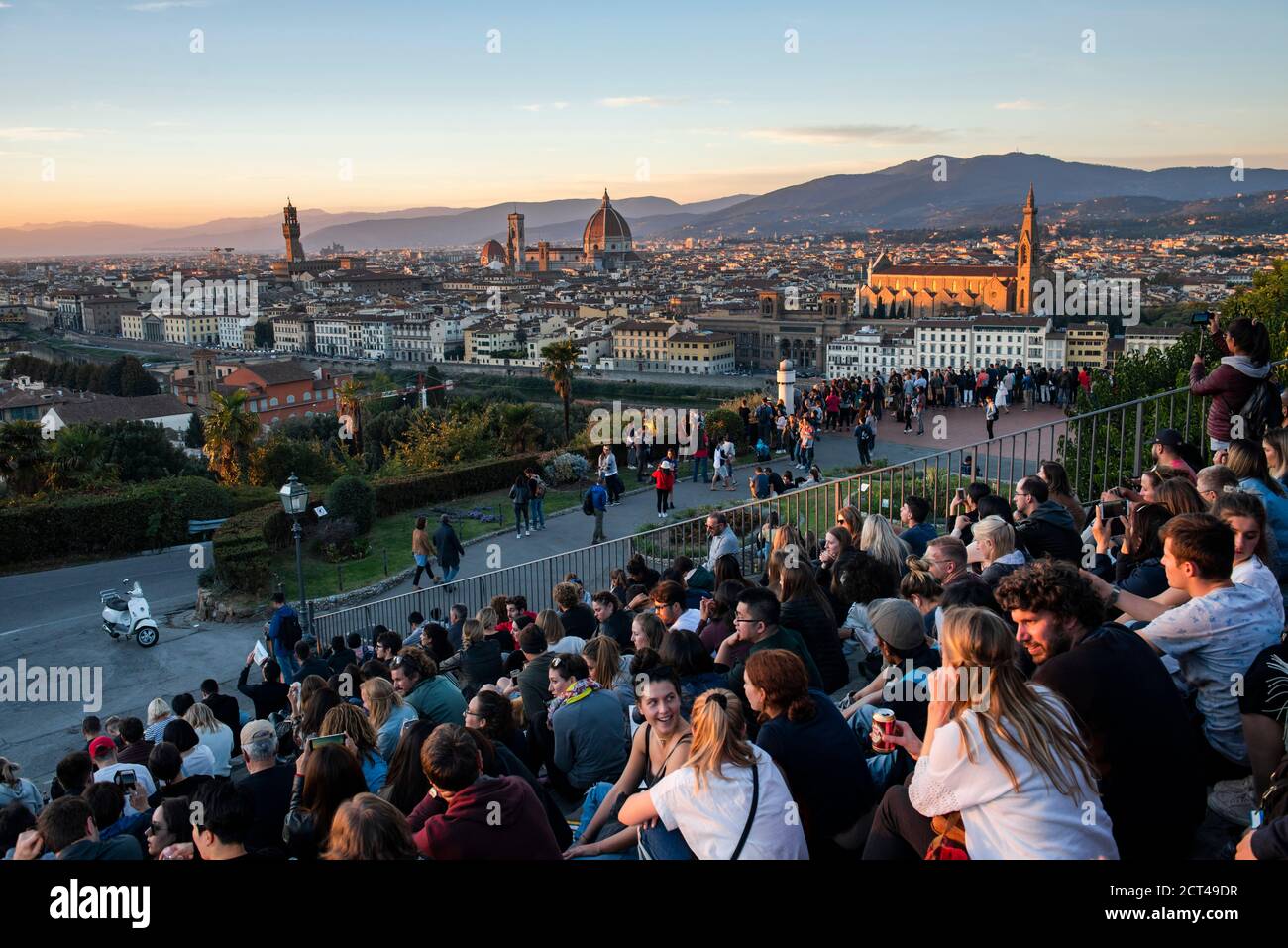 People watching the sunset over Florence, seen from Piazzale Michelangelo Hill, Tuscany, Italy Stock Photo