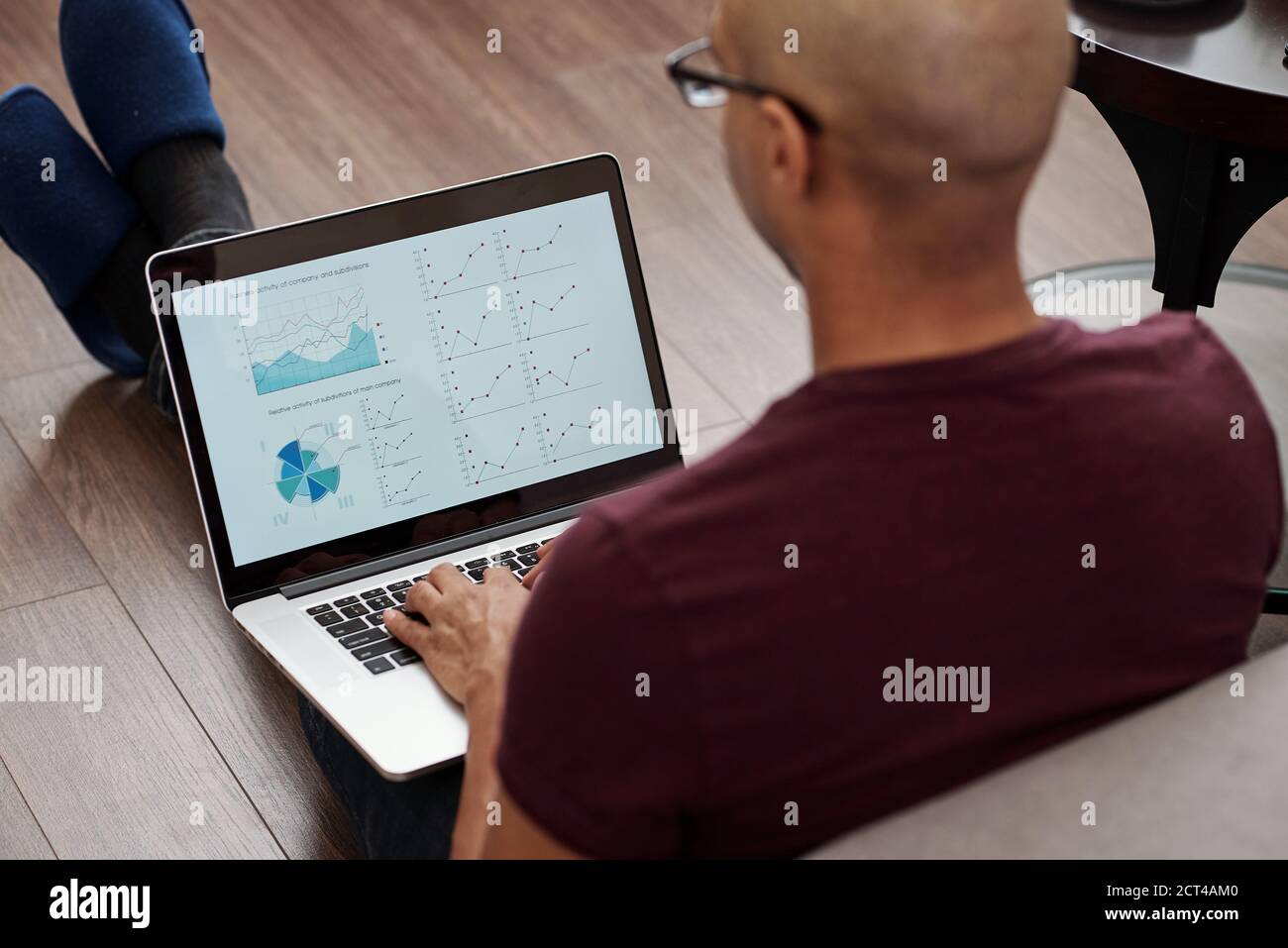 Financial manager working on laptop Stock Photo