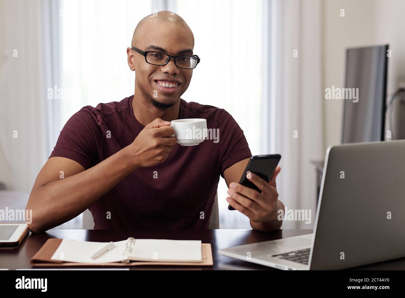 Businessman having coffee break Stock Photo