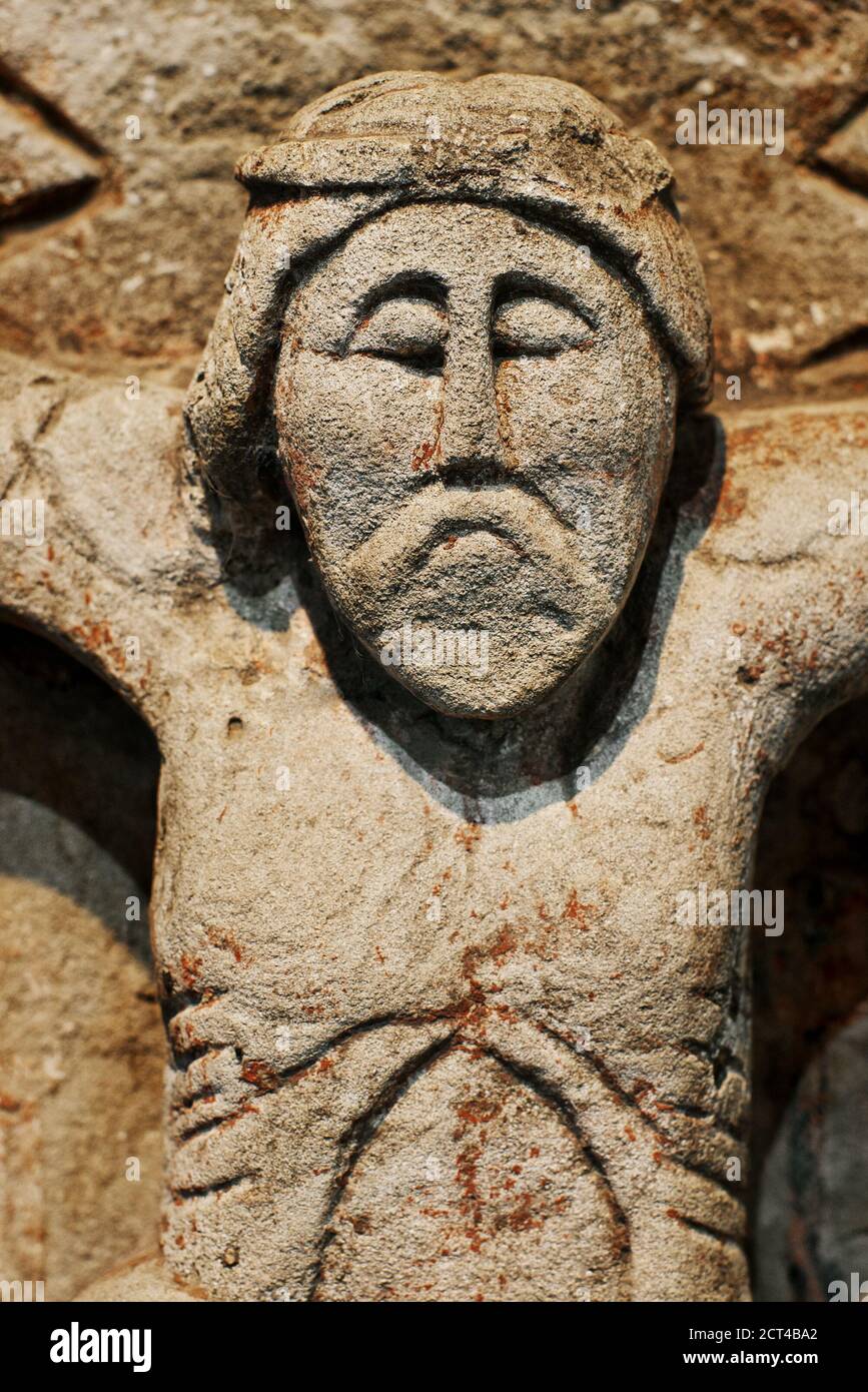 Closeup of antique statue from limestone of Jesus Christ Stock Photo