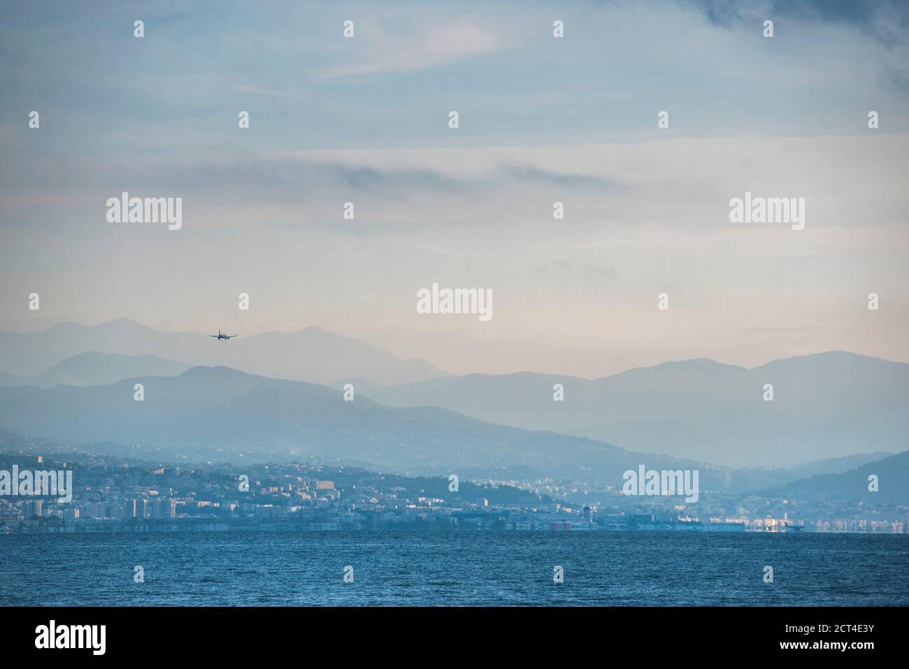 Flight arriving into Nice airport, seen from Antibes, Provence-Alpes-Côte d'Azur, South of France, Europe Stock Photo