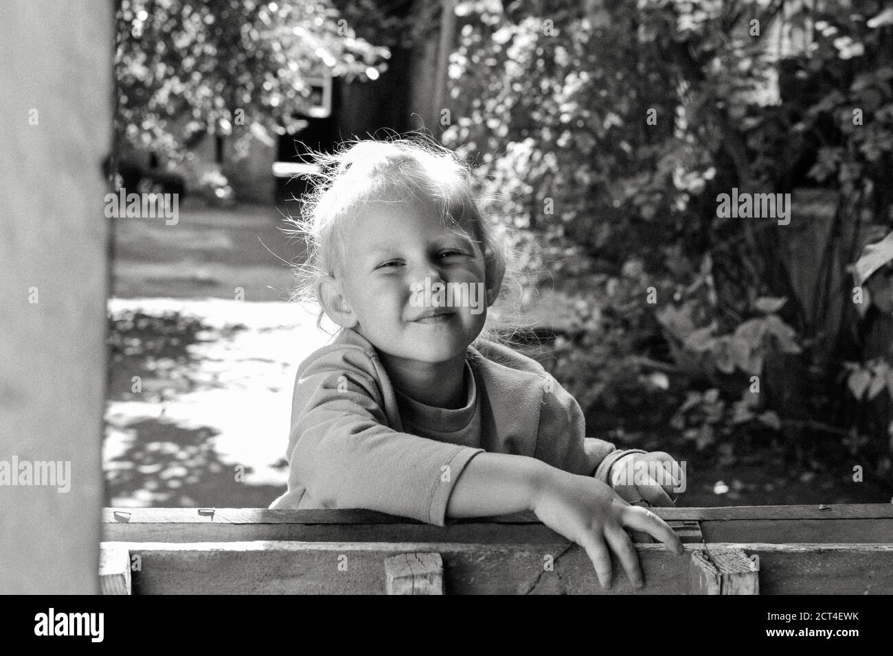 Close up black and white portrait of cute adorable smiling caucasian