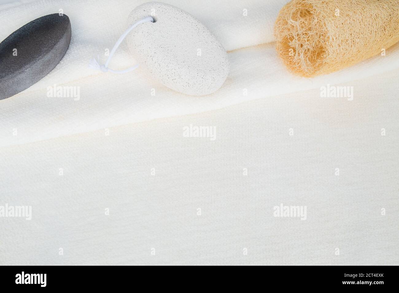 Top view flatlay soft white towel background for organic natural body and foot scrub exfoliating cleaning product display mockup in bathroom or spa Stock Photo