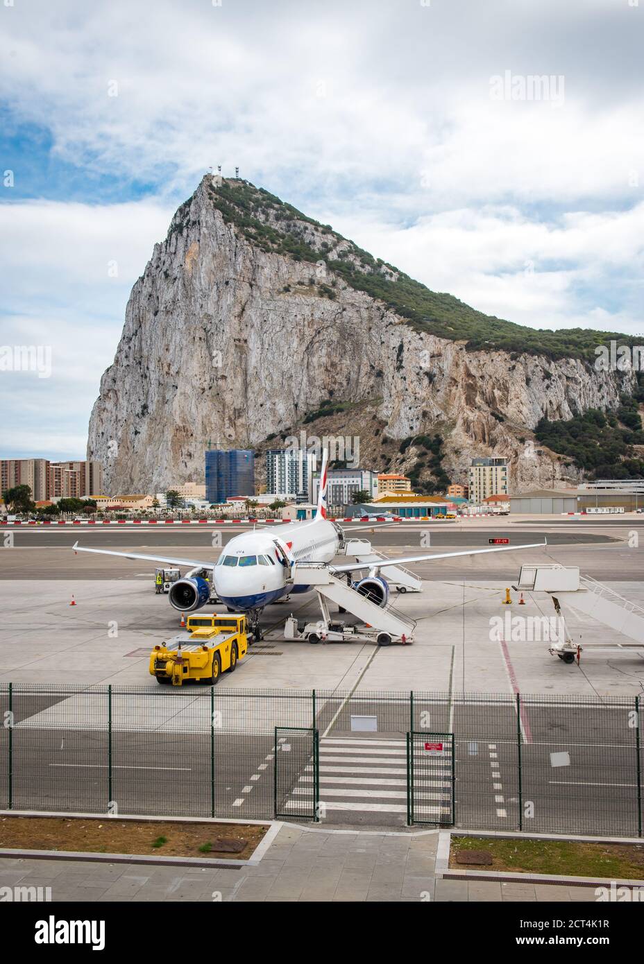 Aeroplane at Gibraltar Airport with view of the Rock Stock Photo