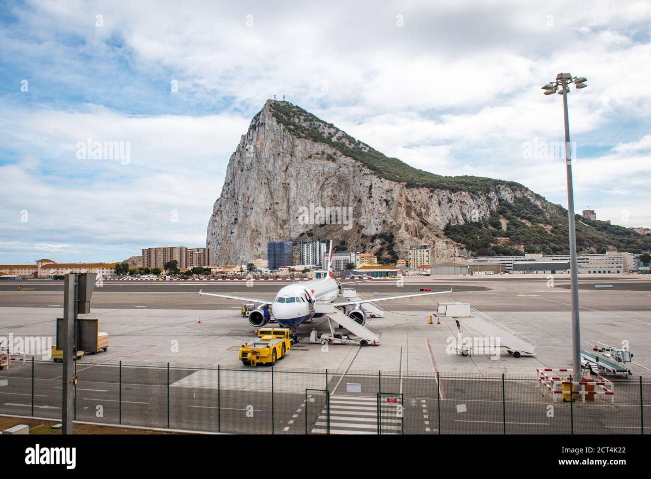 Aeroplane at Gibraltar Airport with view of the Rock Stock Photo