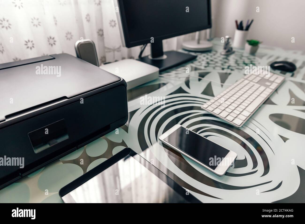 Workstation with table, computer and printer Stock Photo - Alamy