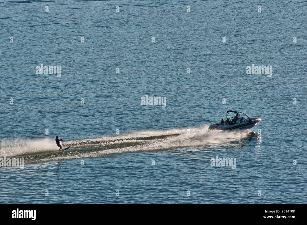 Water skier at Pineview Reservoir, artificial lake in Ogden Valley, Wasatch Mountains, Utah, USA Stock Photo