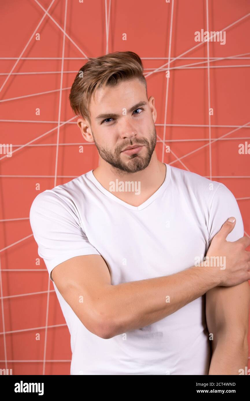 Man bearded guy modern hairstyle in pensive mood pink background. Simple  hacks to make hairstyle better. Use right product styling hair. Confident  with tidy hairstyle. Barber hairstyle tips Stock Photo - Alamy