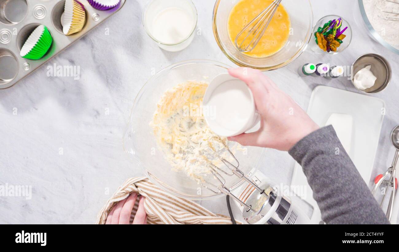 Mixing Ingredients Example Flat lay. Step by step. Mixing ingredient in a mixing bowl with an ...