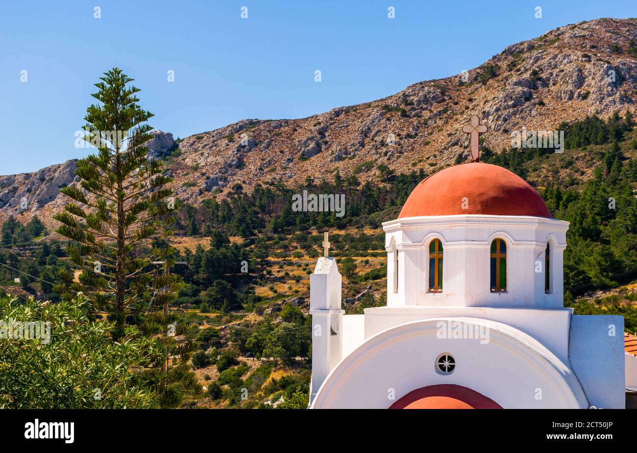 Traditional Red dome chapel in the middle of the mountains in Karpathos Island, Greece Stock Photo