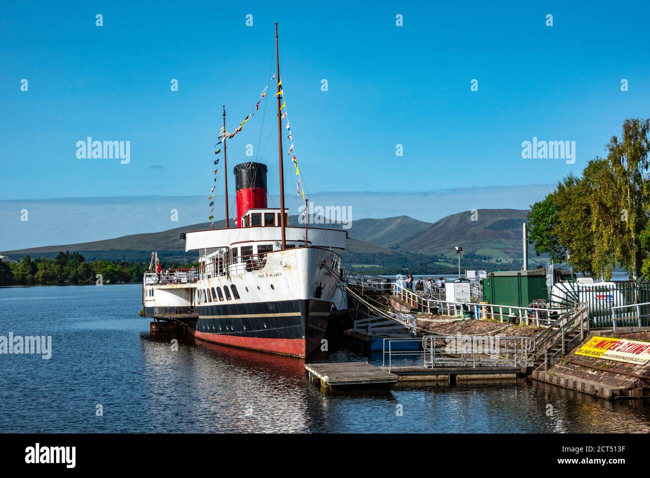 Restored paddle steamer Maid of the Loch moored at its pier at Loch Lomond Shores Balloch West