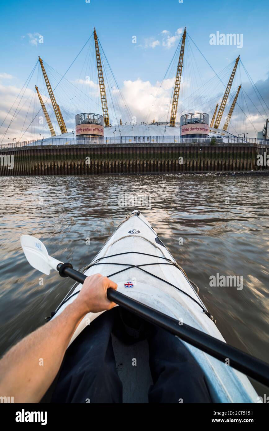 Kayaking on the River Thames past the O2 Arena, Greenwich, London
