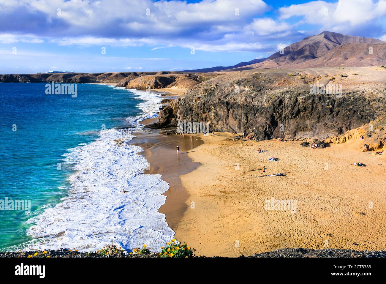 Scenic nature and beautiful colorful beaches of volcanic Lanzarote. Papagayo beach. Canary islands Stock Photo