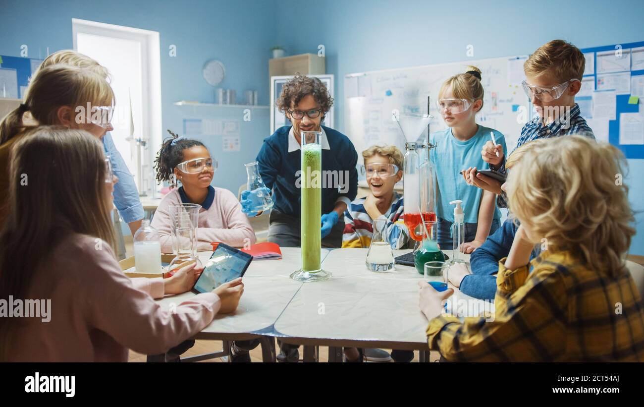 Elementary School Science Chemistry Classroom Teacher Shows Chemical