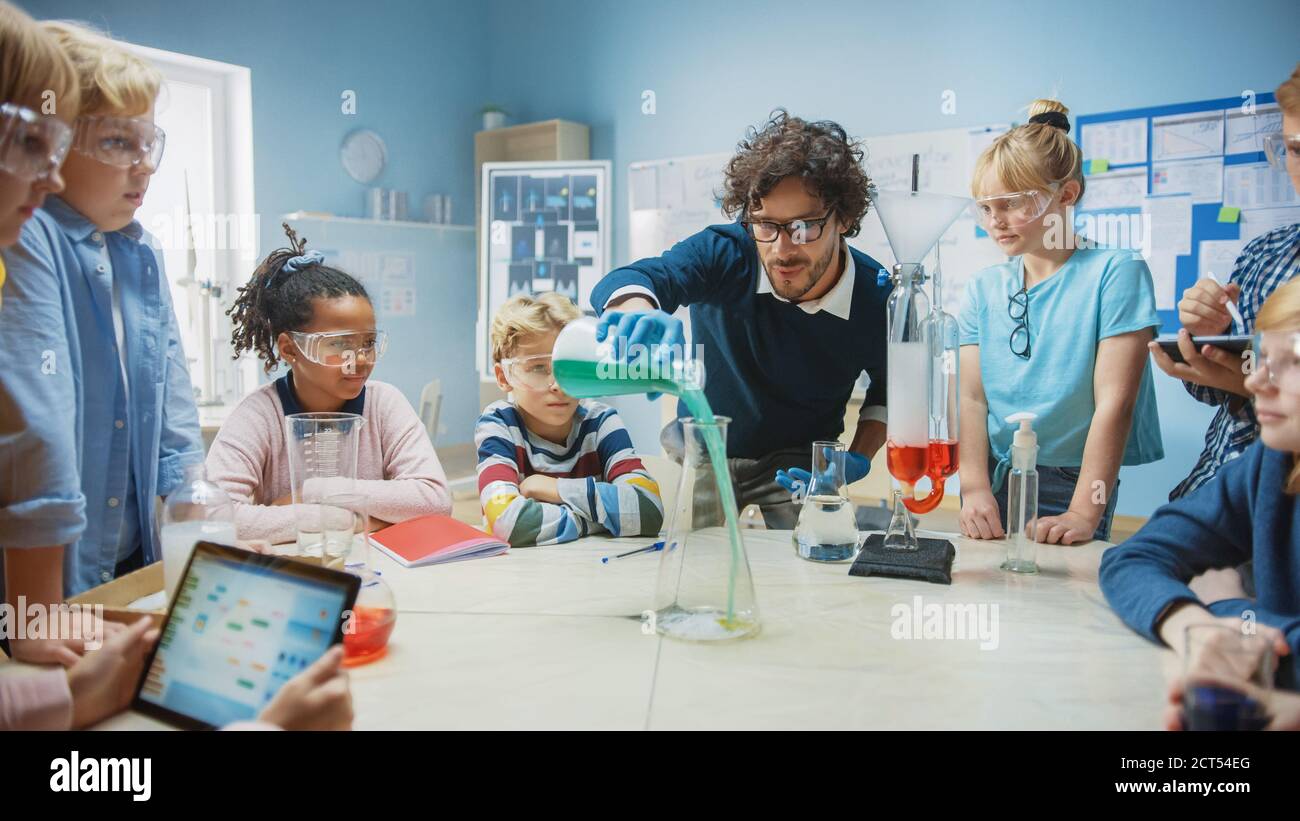 Elementary School Science Chemistry Classroom Teacher Shows Chemical