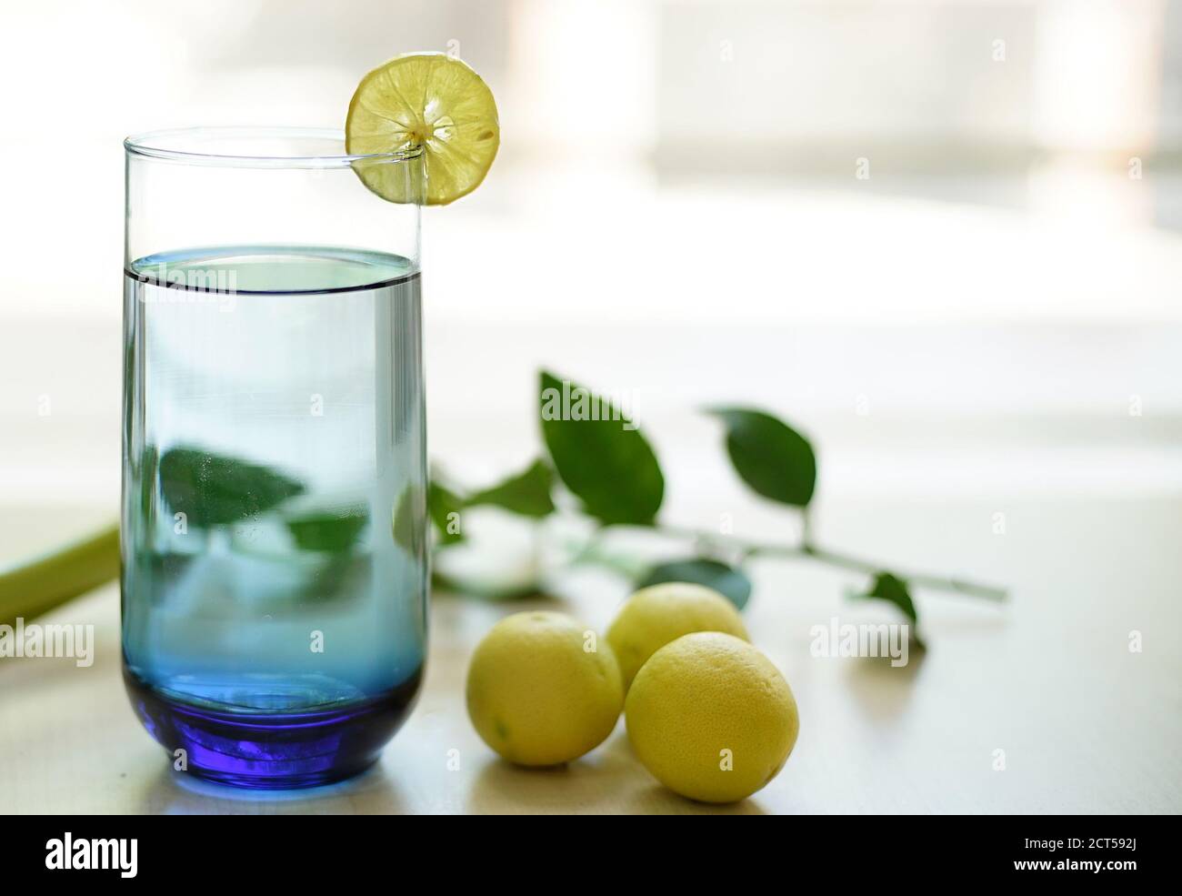 Glass of freshsqueezed lemon juice Stock Photo Alamy