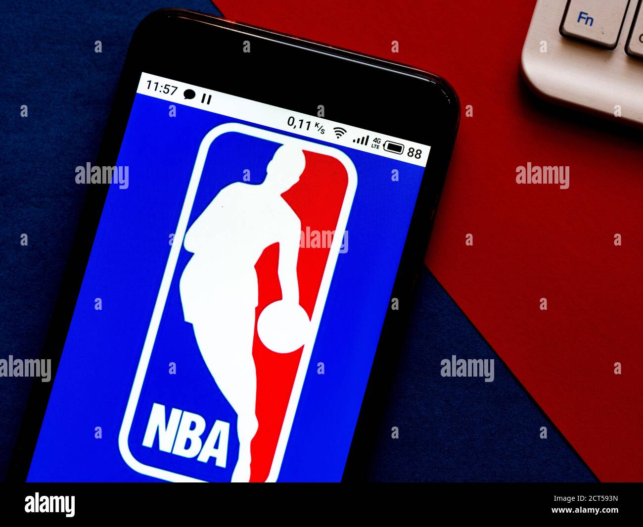 In this photo illustration  a NBA logo is seen displayed on a smartphone Stock Photo