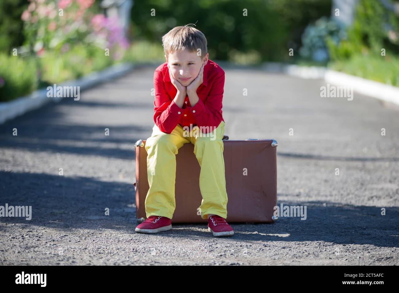 Sad boy suitcase hires stock photography and images Alamy