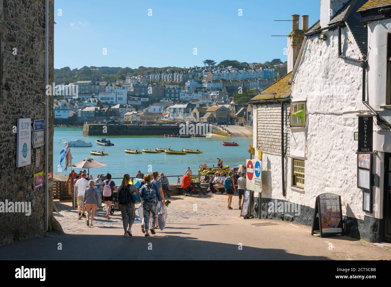 St Ives Cornwall, view in summer of people approaching the harbour area in St Ives, Cornwall, south west England, UK Stock Photo