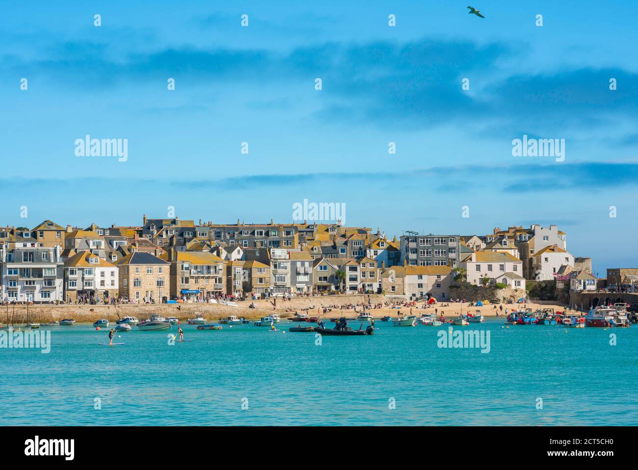 Cornwall property, view in summer across St Ives harbour towards beachfront property, Cornwall, south west England, UK Stock Photo