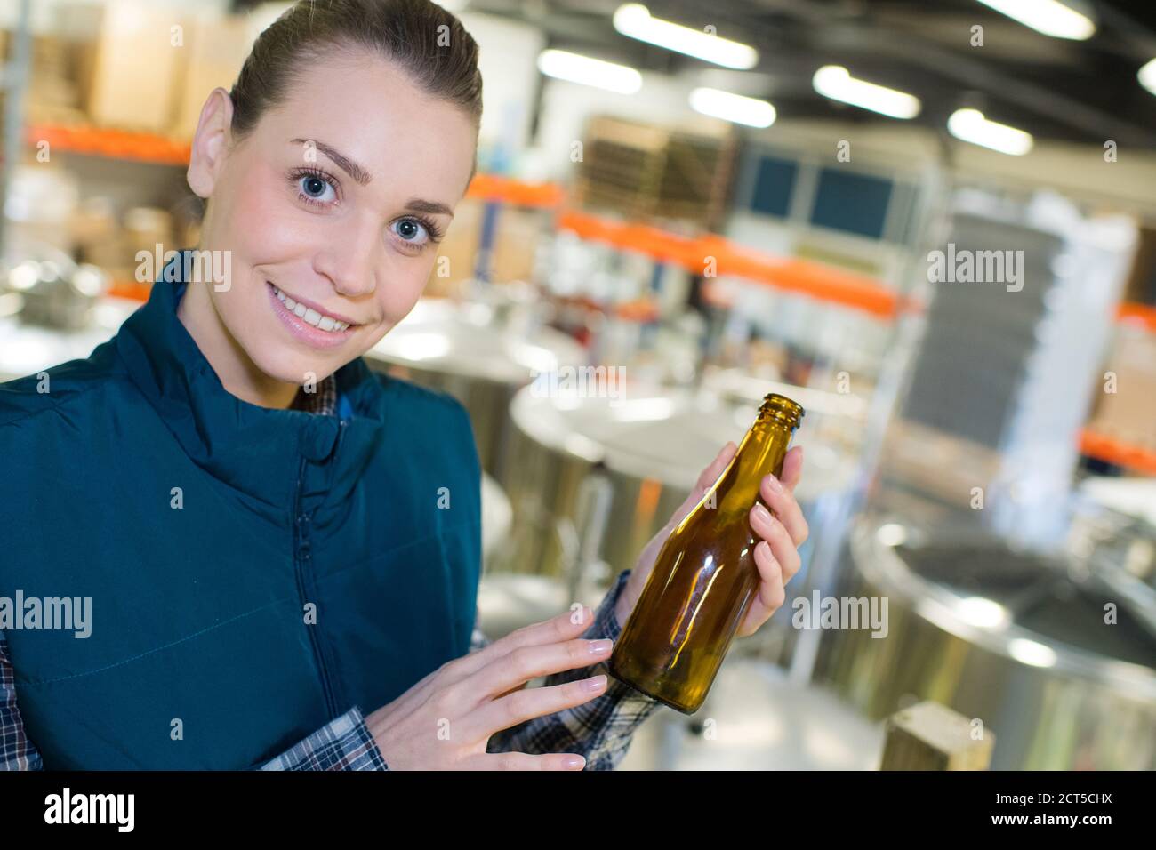Juice beverage factory woman hi-res stock photography and images - Alamy