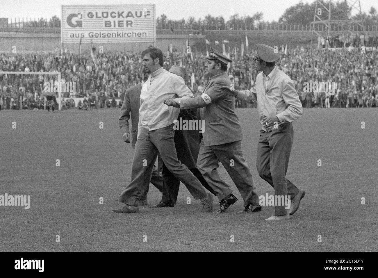 Gelsenkirchen, Deutschland. 17th Sep, 2020. Football fan is led from the field by folders, speedster, feature, symbol photo, edge motif, football, DFB Cup, FC Schalke 04 (GE) - FC Cologne (K) 5: 2, on 06/10/1972 in Gelsenkirchen/Germany. Â | usage worldwide Credit: dpa/Alamy Live News Stock Photo