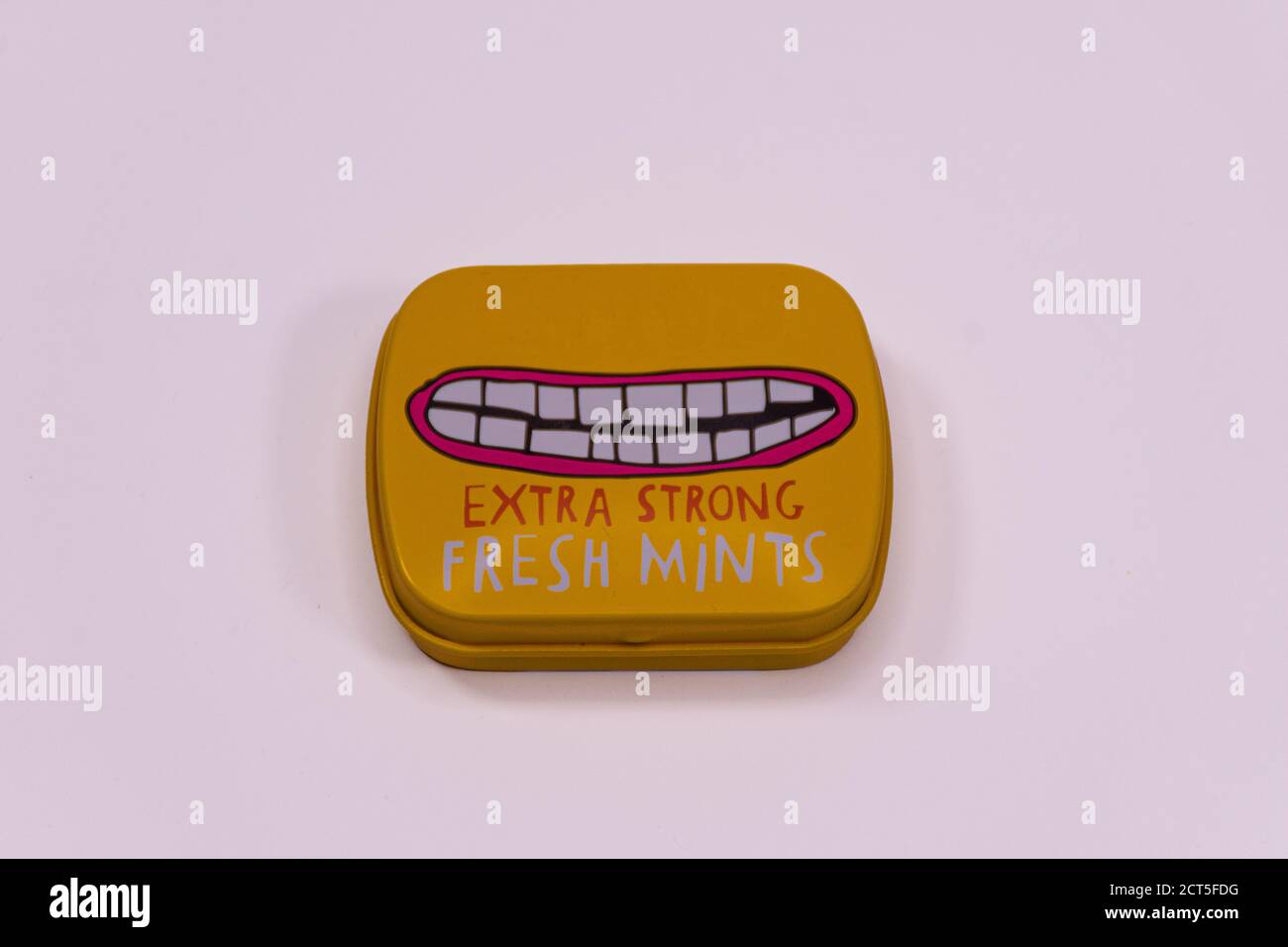 Metal box containing tooth mints Stock Photo Alamy