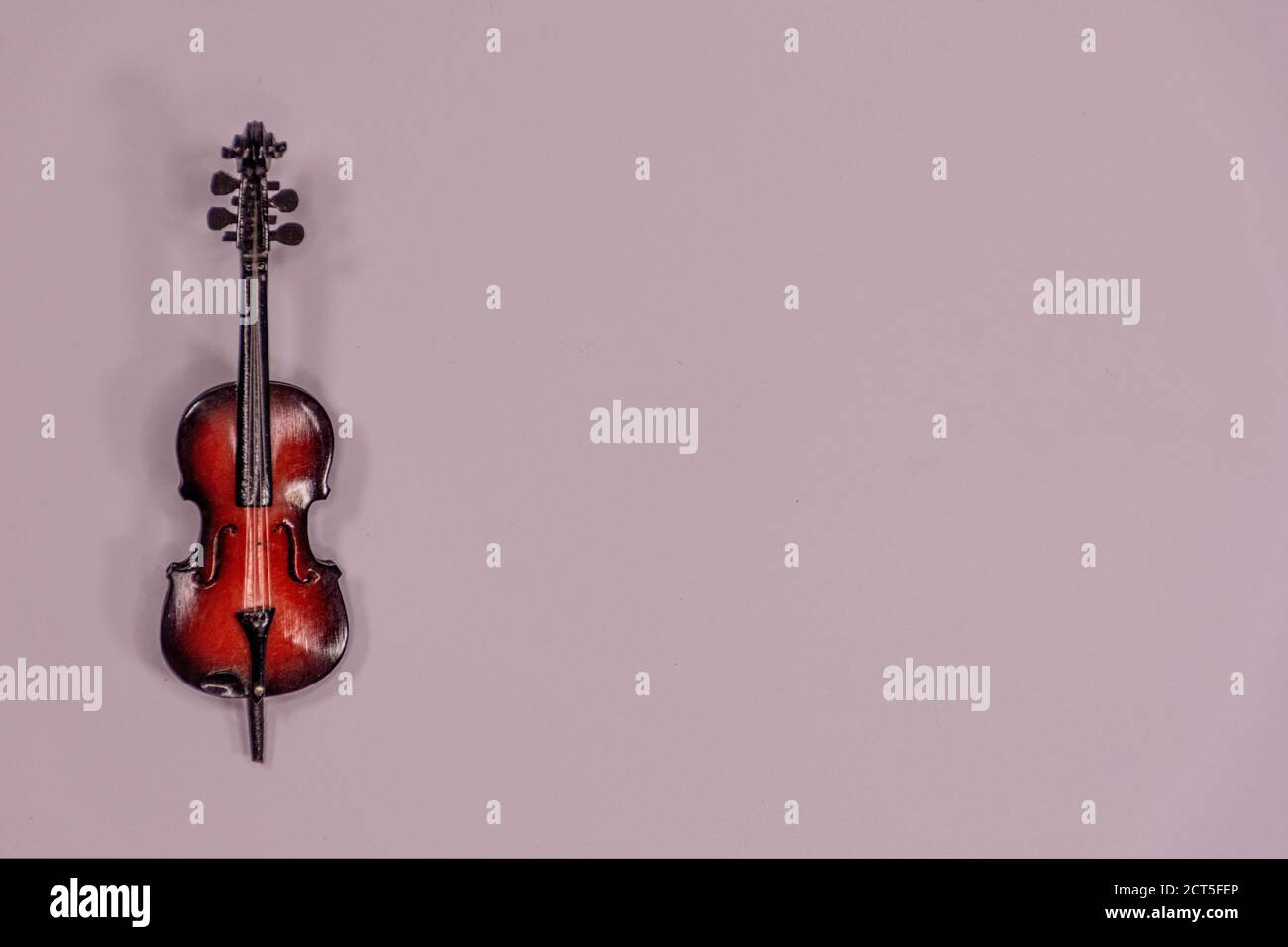 Miniature of a cello with space for writing Stock Photo - Alamy