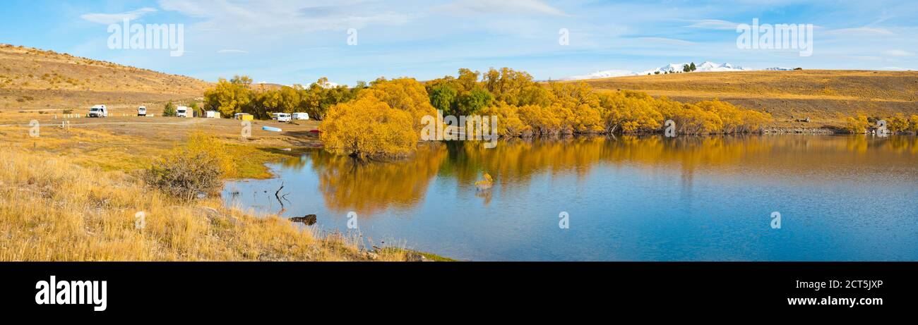 Panoramic Photo of Autumn at Lake Alexandrina Department of Conservation Campsite, South Island, New Zealand Stock Photo