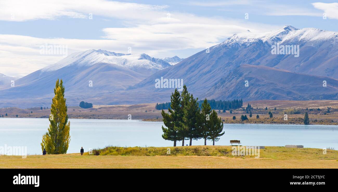 Panoramic Photo of Snow Capped Mountains at Lake Tekapo, South Island, New Zealand Stock Photo