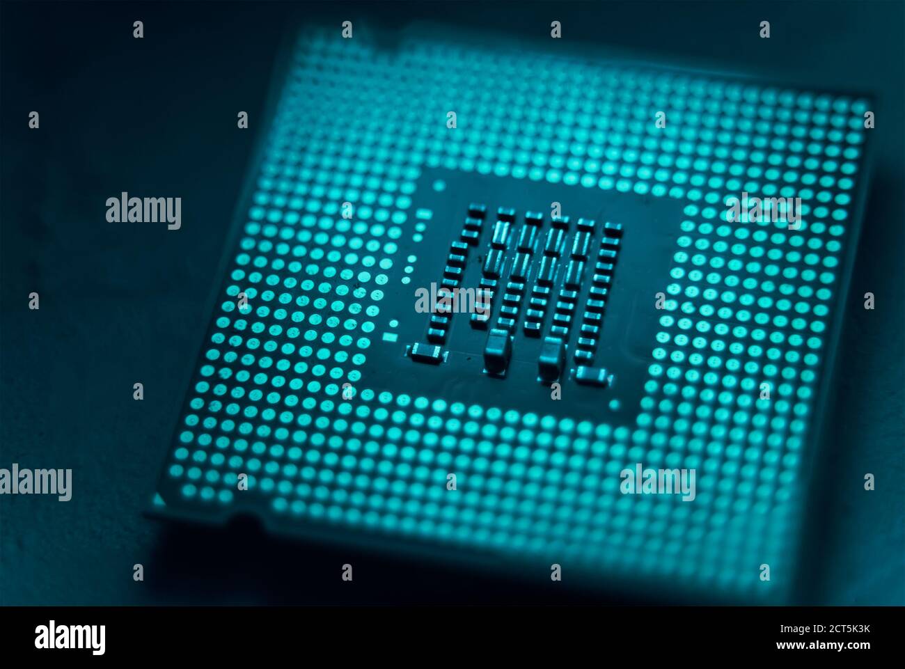 Closeup of CPU Chip Computer Processor in the lab with teal dramatic