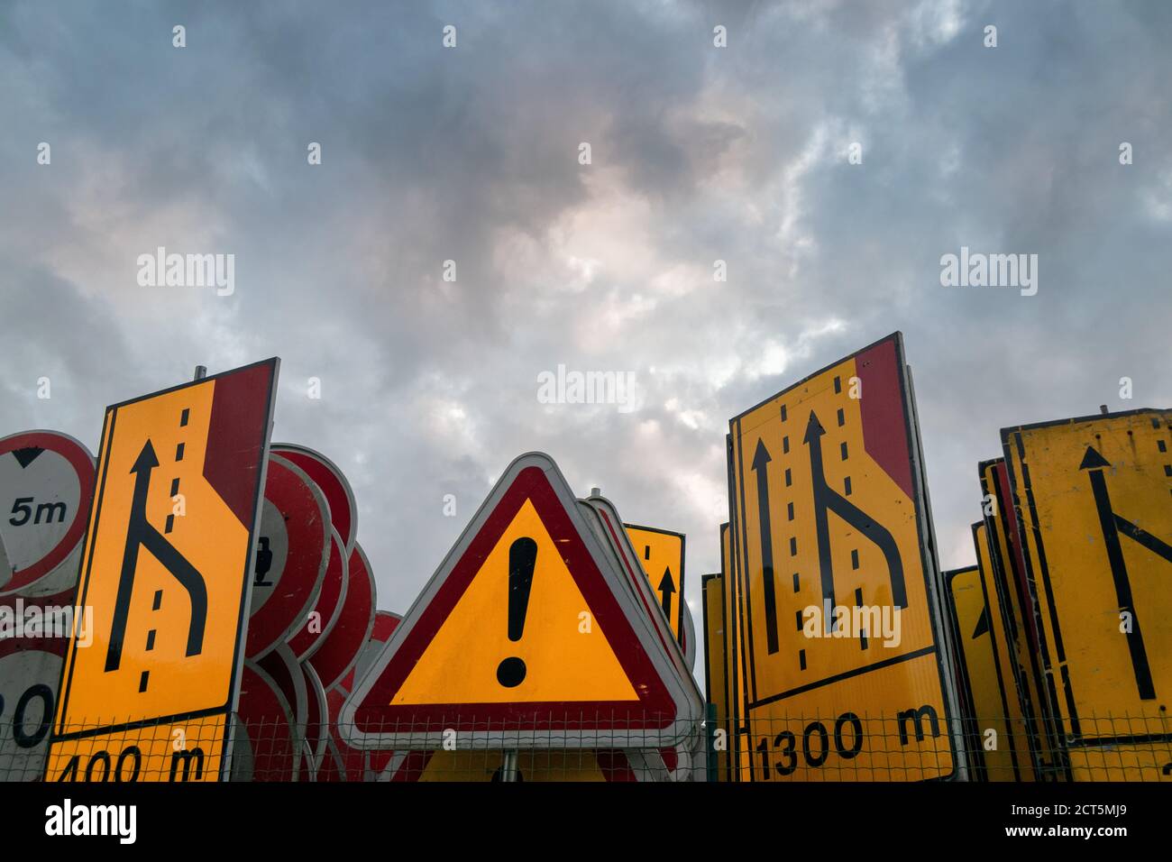 Traffic road signs used for accidents repairs and road maintenance in Cloudy background sky Stock Photo
