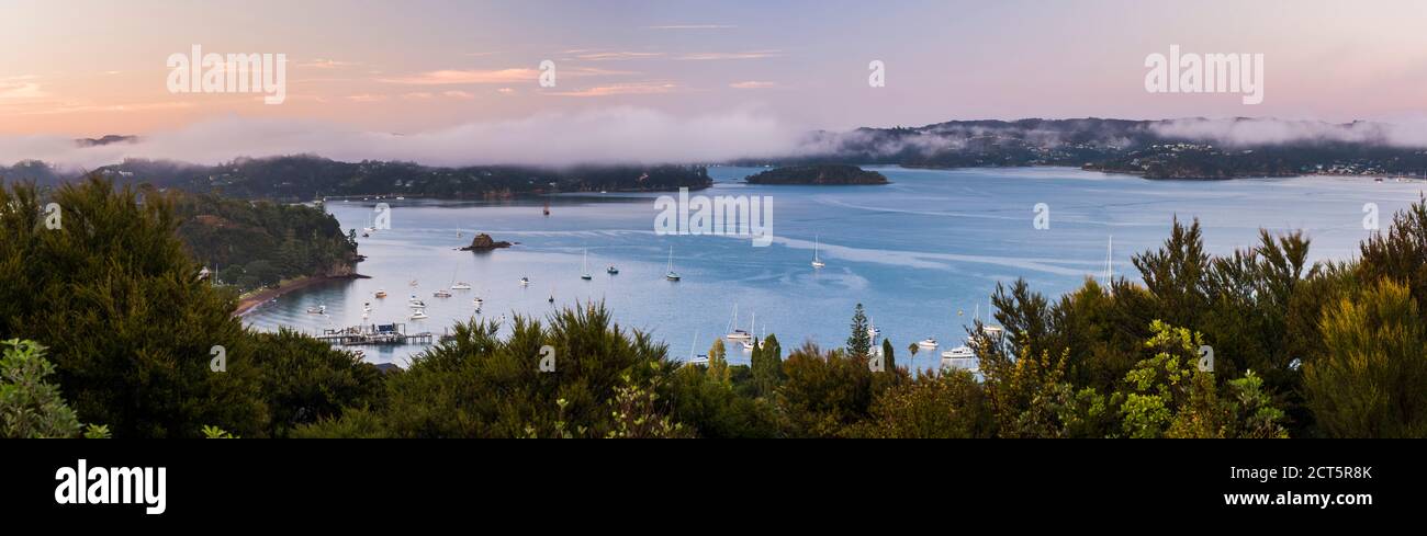 Misty sunrise at Russell, Bay of Islands, Northland Region, North Island, New Zealand Stock Photo