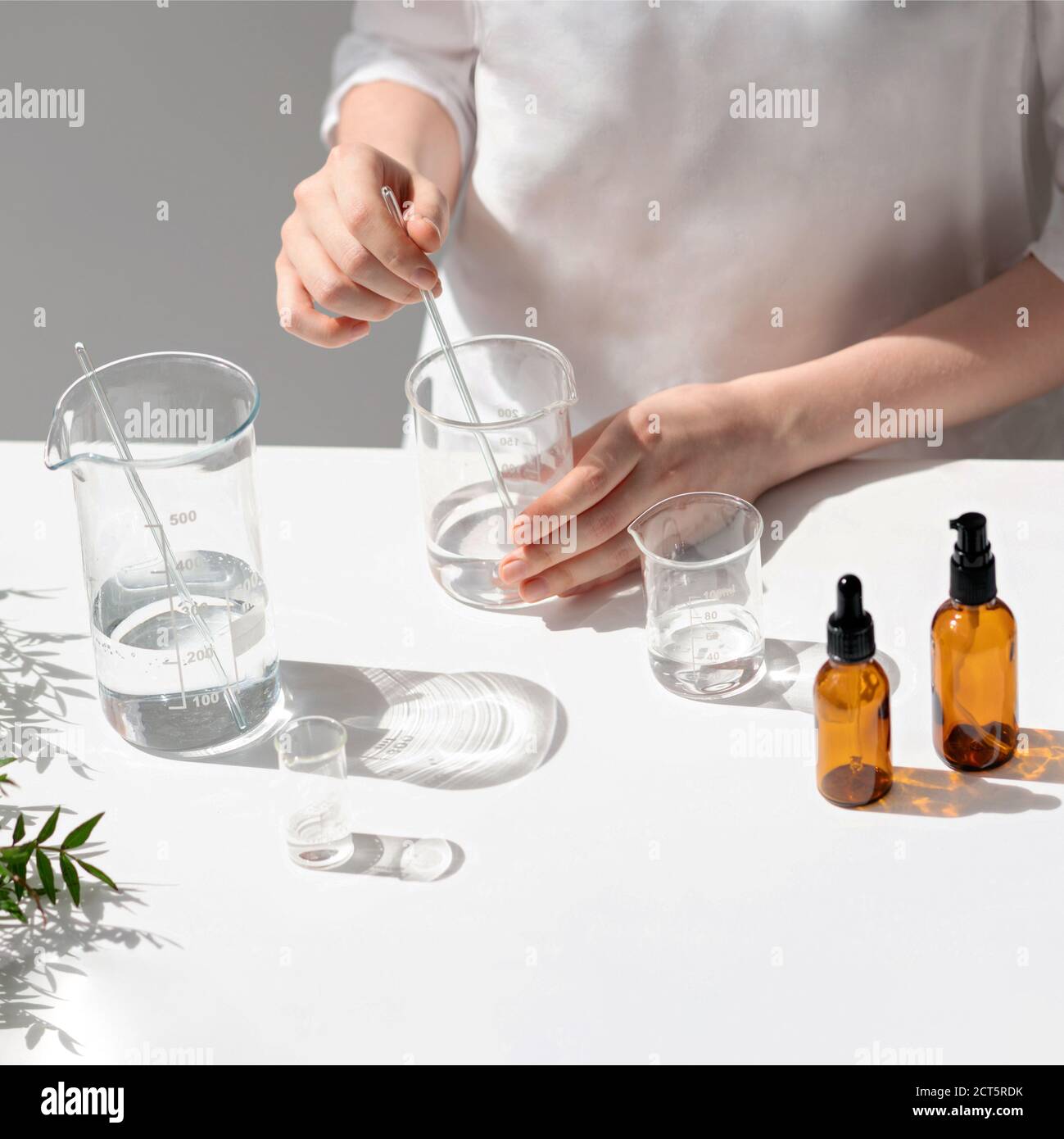 The scientist, dermatologist testing the organic natural cosmetic